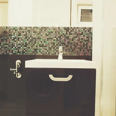 Апартаменты Apartament Jantar Z Ogrodkiem