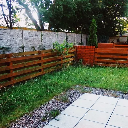 Апартаменты Apartament Jantar Z Ogrodkiem *